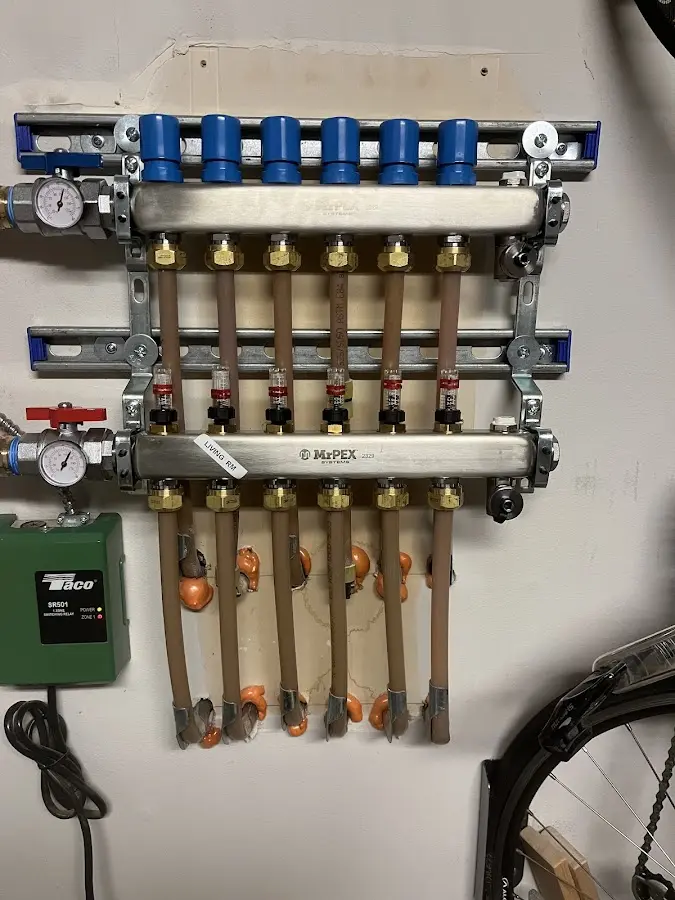 Plumber performing Gas Line Installation at a residential property in Harrisonburg